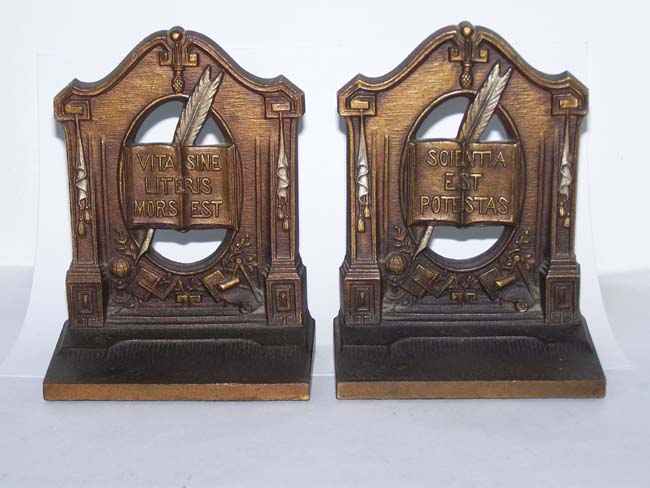 a pair of antique Bookends circa 1925 by Bradley & Hubbard depicting 'Literature and Knowledge'